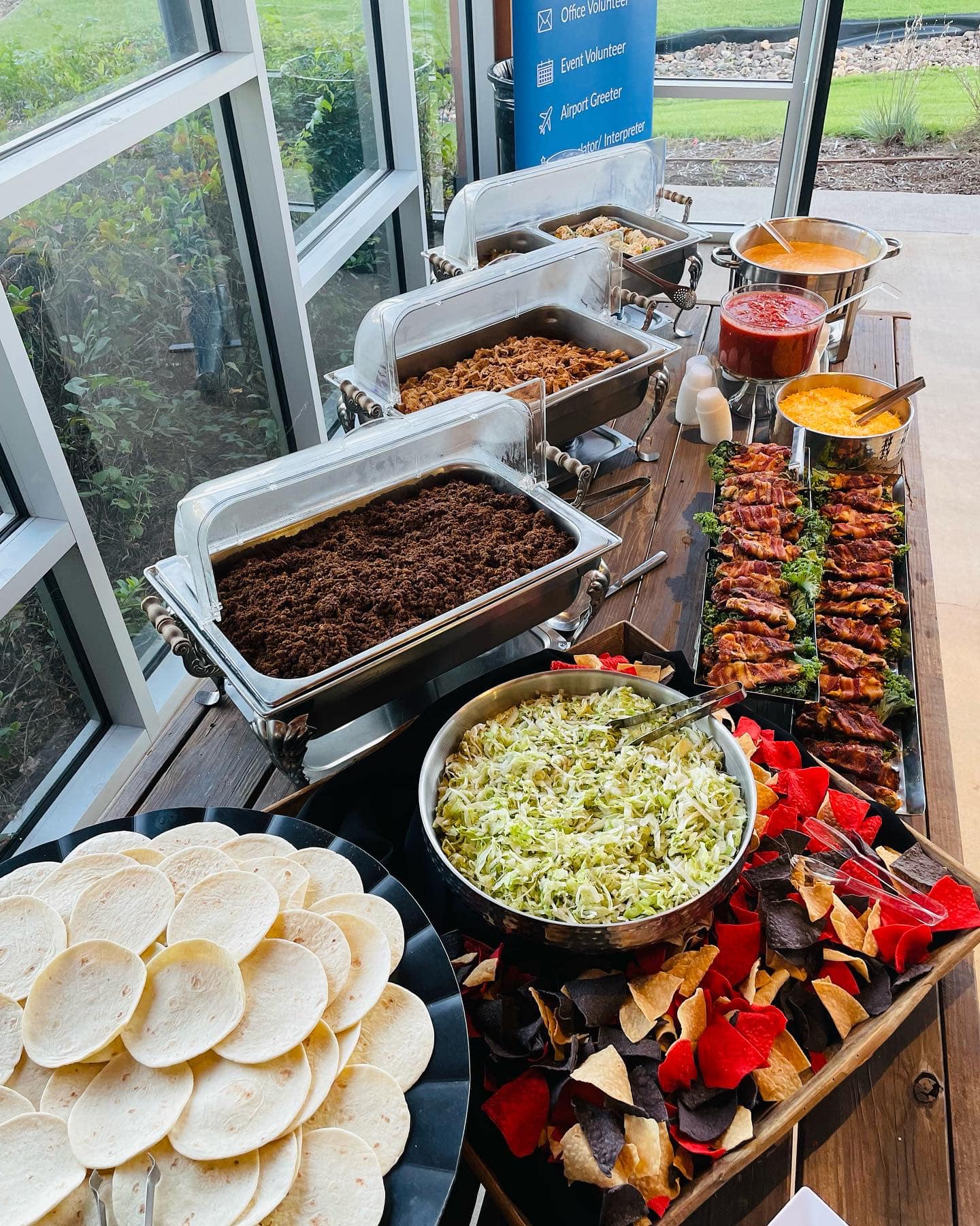 catering table with different mexican inspired dishes